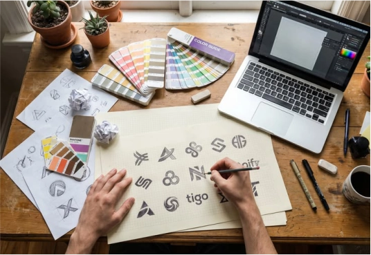 B2B branding agency team optimizing business strategy workflows on dashboard presentation screens